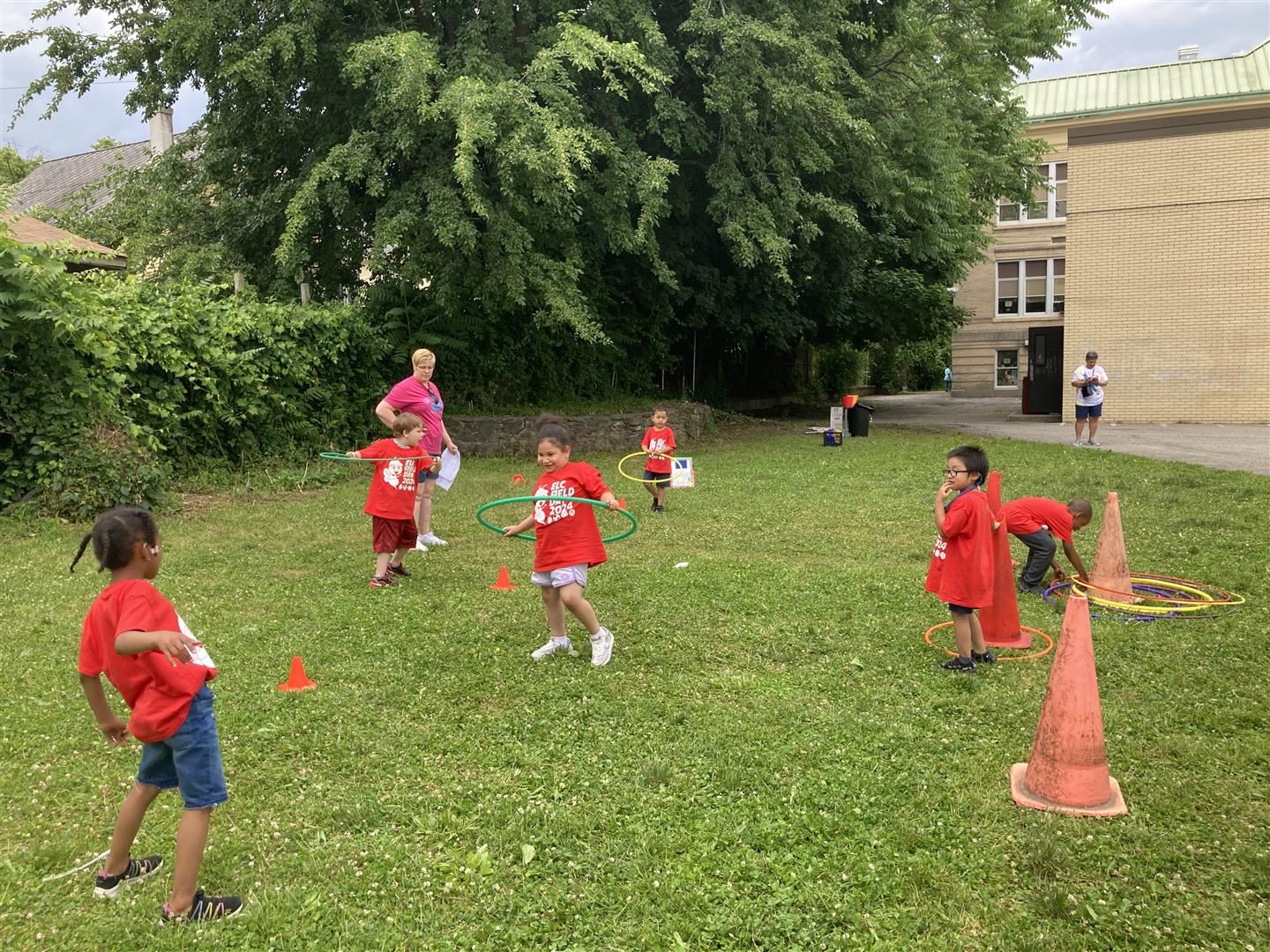 Students hula hoop during field day