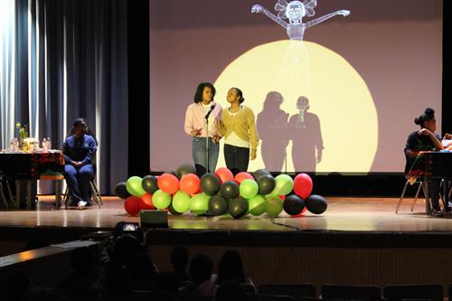 Hevenlie Miller and Drianny Tererro perform Whitney Houston’s “I Wanna Dance with Somebody,”