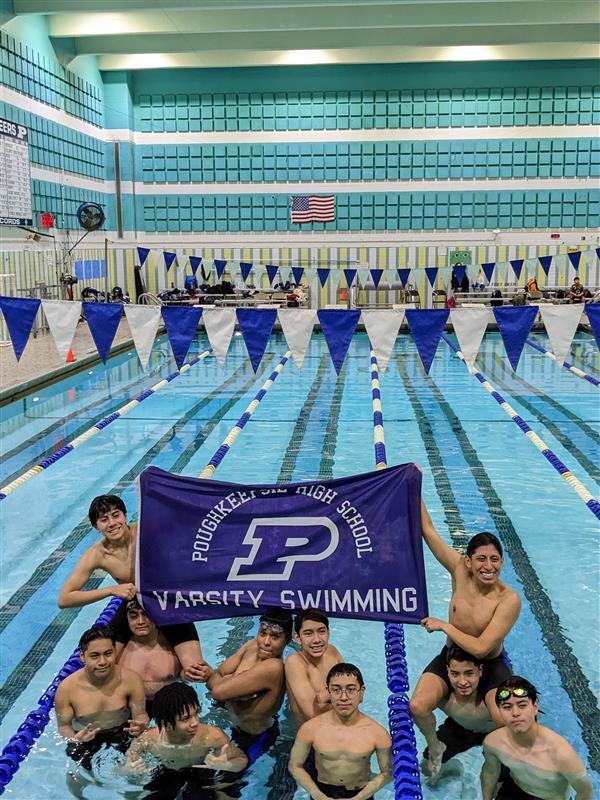 Boys Swim team celebrating senior night