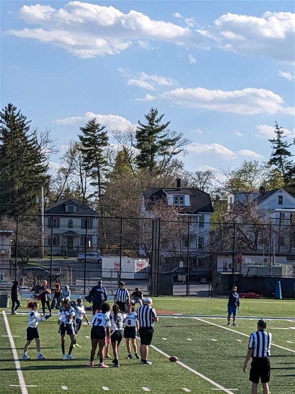 Girls Flag Football Huddling up 4/12/23